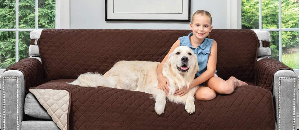 Girl and her dog on the couch