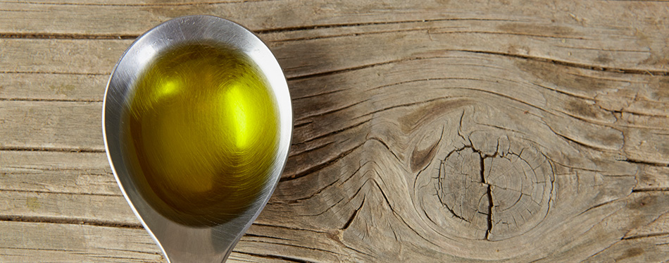 Spoon full of olive oil