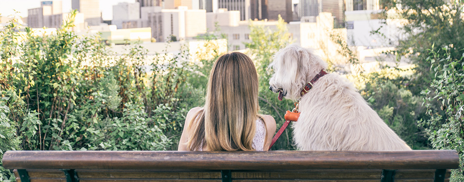 Woman sitting with her dog