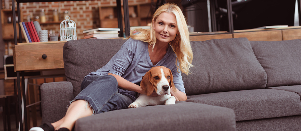 Woman with dog at home