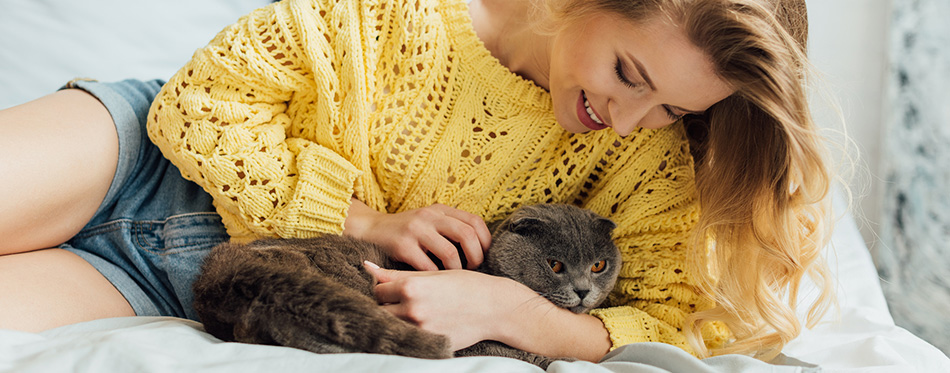 Beautiful smiling girl in knitted