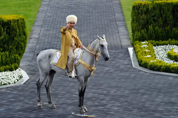 Turkmenistan’s President Gurbanguly Berdymukhamedov rides an Akhal